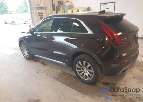 2021 Cadillac Xt4 Fwd Premium Luxury from USA, damaged, VIN 1GYFZCR42MF001347